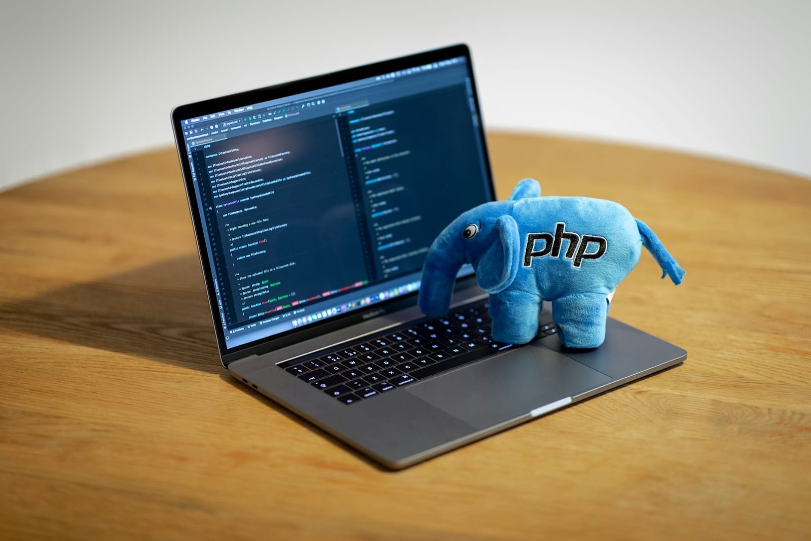 Photo by Ben Griffiths blue elephant figurine on macbook pro